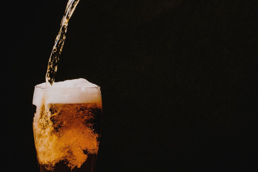 Beer pouring into a glass